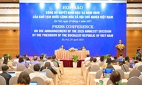 Các phóng viên tham dự Họp báo
