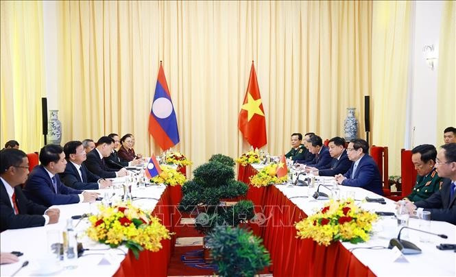 Thủ tướng Phạm Minh Chính hội kiến Tổng Bí thư, Chủ tịch nước Lào Thongloun Sisoulith. Ảnh: Dương Giang/TTXVN Thủ tướng Phạm Minh Chính hội kiến Tổng Bí thư, Chủ tịch nước Lào Thongloun Sisoulith. Ảnh: Dương Giang/TTXVN