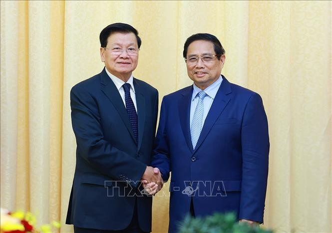 Thủ tướng Phạm Minh Chính hội kiến Tổng Bí thư, Chủ tịch nước Lào Thongloun Sisoulith. Ảnh: Dương Giang/TTXVN Thủ tướng Phạm Minh Chính hội kiến Tổng Bí thư, Chủ tịch nước Lào Thongloun Sisoulith. Ảnh: Dương Giang/TTXVN