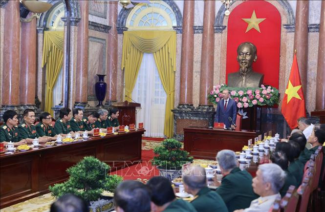 Tổng Bí thư, Chủ tịch nước Tô Lâm nói chuyện với các cựu chiến binh Sư đoàn 308. Ảnh: Lâm Khánh/TTXVN Chú thích ảnh