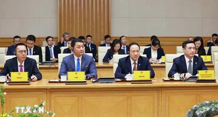Các doanh nghiệp Trung Quốc tham dự tọa đàm. Ảnh: Dương Giang/TTXVN tt4.jpg