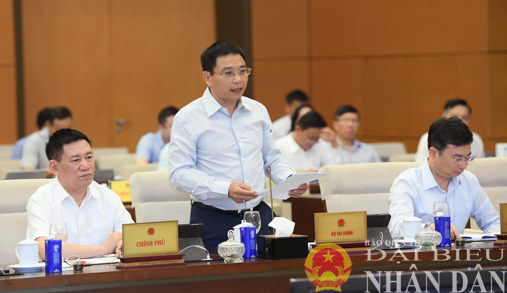 Bộ trưởng Bộ Tài chính Nguyễn Văn Thắng trình bày Báo cáo của Chính phủ. Ảnh: Lâm Hiển dbnd_br_bo-truong-bo-tai-chinh-nguyen-van-thang.jpg