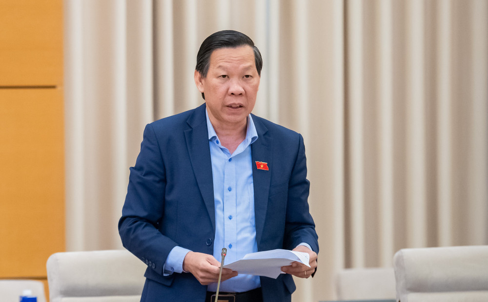 Chủ nhiệm Ủy ban Kinh tế và Tài chính Phan Văn Mãi trình bày Báo cáo một số vấn đề lớn về việc tiếp thu, giải trình, chỉnh lý dự thảo Luật Quản lý và đầu tư vốn nhà nước tại doanh nghiệp. Ảnh: Hồ Long Chủ nhiệm Ủy ban Kinh tế và Tài chính Phan Văn Mãi trình bày Báo cáo một số vấn đề lớn về việc tiếp thu, giải trình, chỉnh lý dự thảo Luật Quản lý và đầu tư vốn nhà nước tại doanh nghiệp. Ảnh: Hồ Long