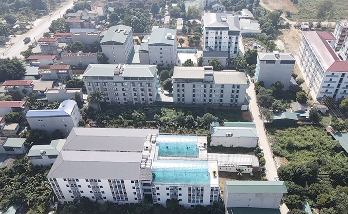 Những khu nhà trọ, chung cư mini xây dựng không phép ở xã Thạch Hoà, huyện Thạch Thất có quy mô hàng trăm phòng như các khu chung cư thương mại. (Ảnh: CAND) Hà Nội: Thành lập đoàn thanh tra vi phạm đất đai và trật tự xây dựng tại huyện Thạch Thất -0