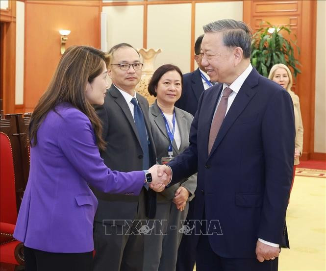 Tổng Bí thư Tô Lâm với các thành viên đoàn doanh nghiệp Hội đồng Kinh doanh Hoa Kỳ - ASEAN. Ảnh: Thống Nhất/TTXVN